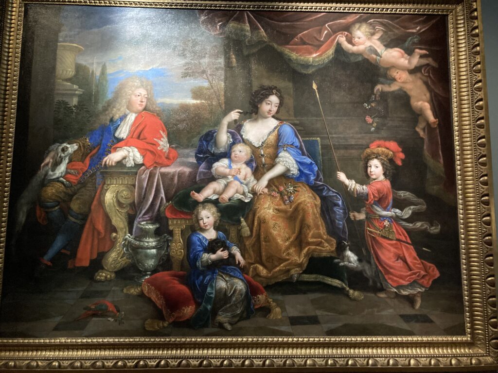 Portrait de famille : Louis de France entouré de sa femme, Marie-Anne de Bavière et de leurs trois enfants : le duc de Bourgogne, le duc d'Anjou (futur Philippe V d'Espagne) et le duc de Berry